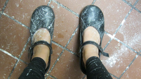 shoes covered in flour after baking all weekend